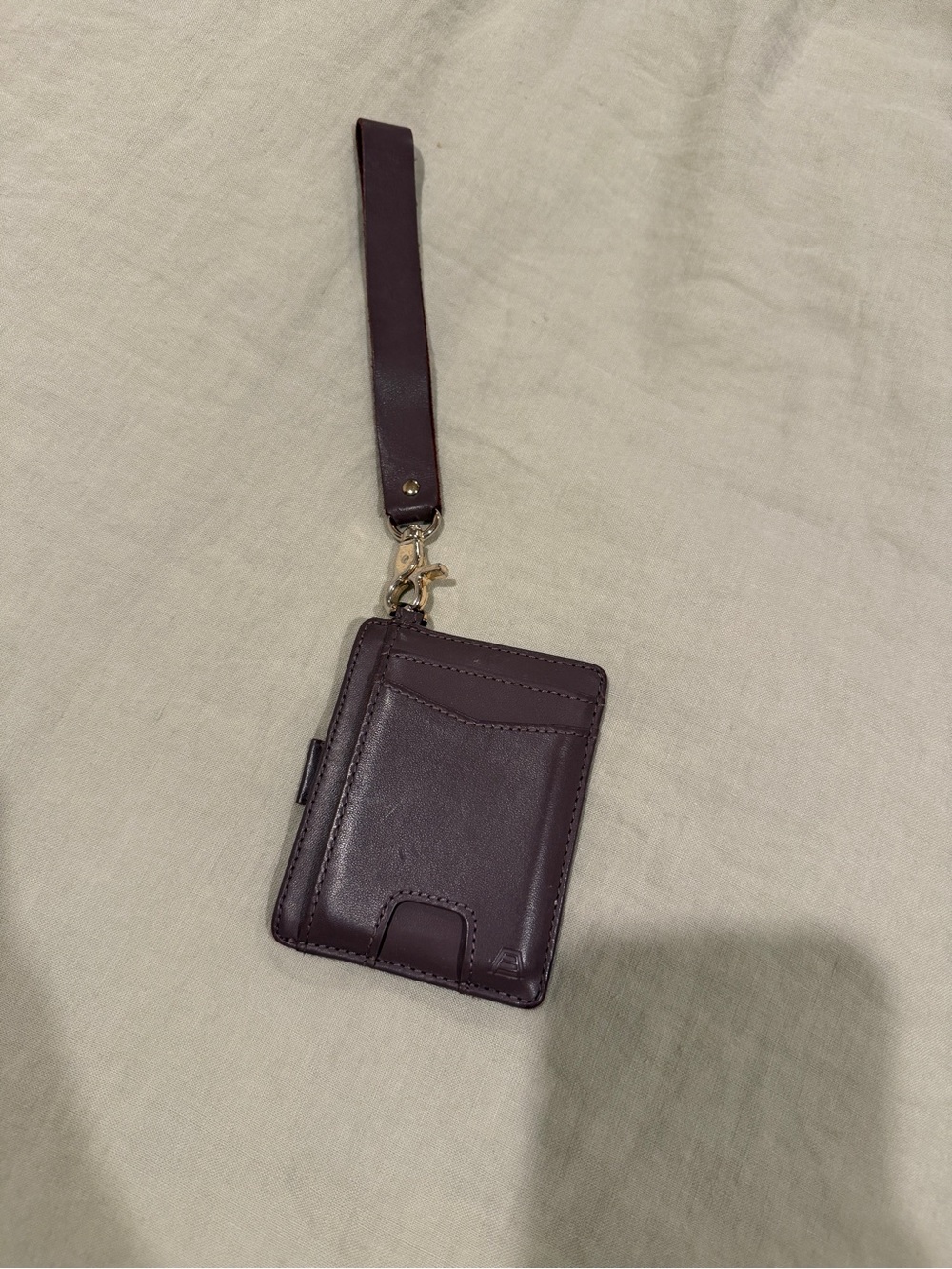 Leather Wrist Strap Card Holder in Deep Plum